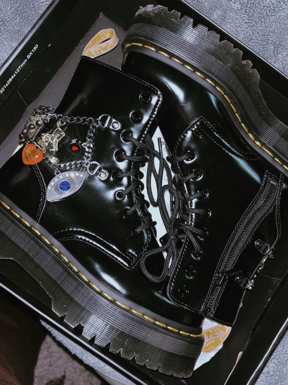 Dr. Martens Black Patent Combat Boots with Yellow Stitching